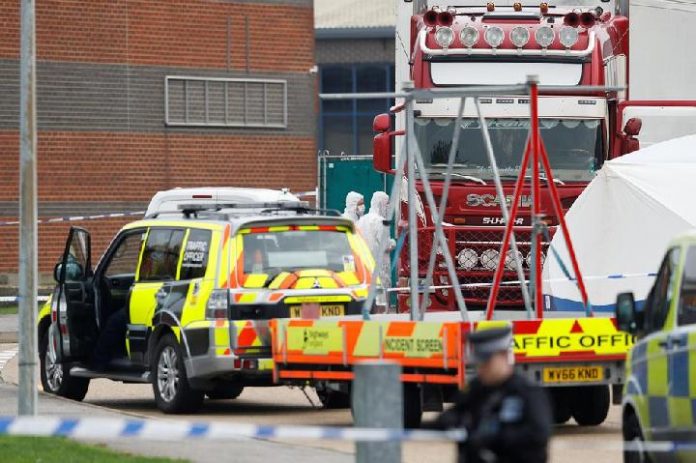 Police is seen at the area where dead bodies were discovered in a lorry container in Grays, Essex, Britain on Oct. 23. REUTERS/PETER NICHOLLS