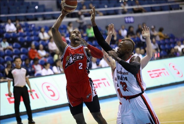 Abu Tratter Alaska Aces’ Abu Tratter scores against Blackwater Elite’s Marqus Blakely. PBA PHOTO