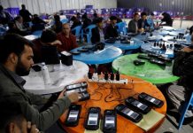 Afghanistan braces for ‘political uncertainty’ Afghan election commission workers transfer data from biometric devices to the main server at a warehouse in Kabul, Afghanistan on Oct. 7. REUTERS/MOHAMMAD ISMAIL