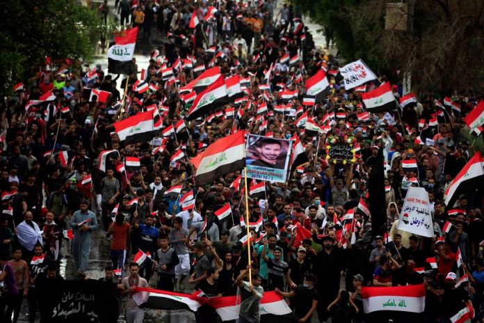 At least 40 killed in Iraq protests Demonstrators take part in a protest over corruption, lack of jobs and poor services in Najaf, Iraq on Oct. 25. REUTERS/ALAA AL-MARJANI