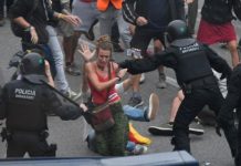 Violent clashes erupt outside the airport in Barcelona, Spain on Monday. AFP