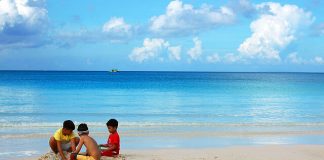 Kids play with the famous white sand in Boracay Island, Malay, Aklan. According to Philippine Chamber of Commerce and Industry-Boracay president Elena Brugger, Filipino kids in the island are now “influenced by the diversity of culture” and the “traditional cultures among them are slowly diminishing.” PHOTO FROM KEN WILSON LEE VIA FLICKR/CREATIVE COMMONS