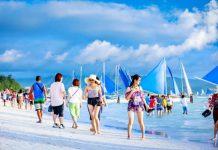 DTI urged Boracay tourists to patronize ‘green products’ Tourists enjoy the world-famous white sand beach of Boracay Island in Malay, Aklan. Recently, the Department of Trade and Industry here urged tourists to support the “green products” of the island. SHUTTERSTOCK