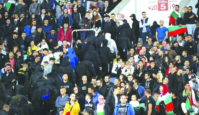 Bulgarian soccer fans Bulgarian fans leave the stadium during the Euro 2020 group A qualifying soccer match between Bulgaria and England, at the Vasil Levski national stadium, in Sofia, Bulgaria on Oct. 14, 2019. AP