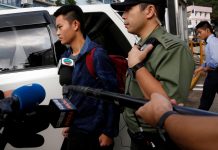 Chan Tong-kai, a Hong Kong citizen who was accused of murdering his girlfriend in Taiwan last year, leaves from Pik Uk Prison, in Hong Kong, China on Oct. 23. REUTERS/TYRONE SIU
