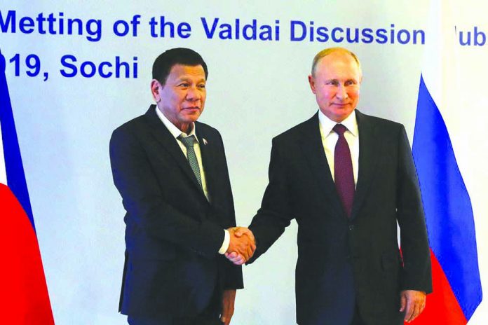 Duterte Putin Russian President Vladimir Putin shakes hands with President Rodrigo Duterte during their meeting in Sochi, Russia on Oct. 3, 2019. KREMLIN VIA REUTERS