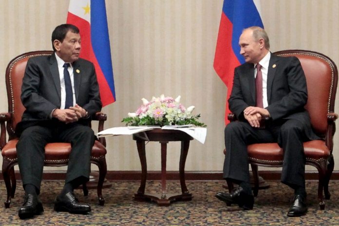 Duterte Putin Rodrigo Duterte and Vladimir Putin. AFP
