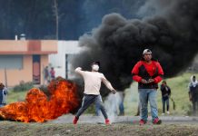 Ecuador arrests shopkeepers, man dies as protests rage A protester aims to throw as people block a road amid clashes with soldiers during a demonstration after Ecuador’s President Lenin Moreno’s government ended the four-decade-old fuel subsidies in Lasso, Ecuador on Oct. 6. REUTERS/CARLOS GARCIA RAWLINS