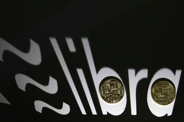 Facebook Libra cryptocurrency logo Shadow of a 3D-printed Facebook Libra cryptocurrency logo is seen near cryptocurrency representation in this illustration taken Sept. 13. DADO RUVIC/REUTERS