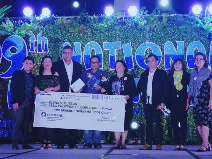 Governor Samuel Gumarin Guimaras Governor Samuel Gumarin (4th from left) and Guimaras Provincial Employment and Services Office manager Elena Quezon receive the Plaque of Recognition during the 19th National PESO Congress on Oct. 9 at SMX Convention Center Bacolod City, Negros Occidental.