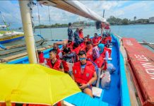 INCONVENIENT RIDE. These boat passengers bound for Guimaras from Iloilo City are exposed to the elements. Motorboats crossing the Iloilo Strait are no longer allowed to use tarpaulin covers. IAN PAUL CORDERO/PN
