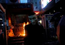 HK metro partially reopens after weekend of protests A masked anti-government protester leaves after helping to set a fire at the entrance of a metro station in Hong Kong, China on Oct. 6. REUTERS/SUSANA VERA
