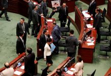 Hong Kong legislature suspended amid chaos A lawmaker (top) shouts at Chief Executive Carrie Lam as she leaves the Legislative Council in Hong Kong, China on Oct. 17. REUTERS/KIM KYUNG-HOON