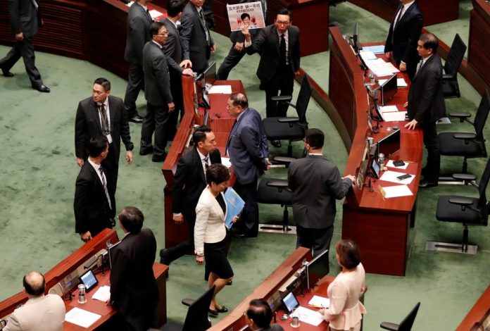 Hong Kong legislature suspended amid chaos A lawmaker (top) shouts at Chief Executive Carrie Lam as she leaves the Legislative Council in Hong Kong, China on Oct. 17. REUTERS/KIM KYUNG-HOON