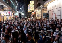 Hong Kong protesters rampage across city People attend a march in Causeway Bay in solidarity with a student protester who got shot with live ammunition in Hong Kong, China on Oct. 2. REUTERS/SUSANA VERA