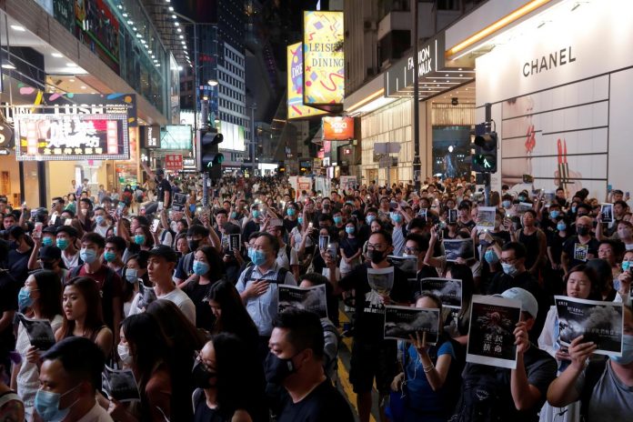 Hong Kong protesters rampage across city People attend a march in Causeway Bay in solidarity with a student protester who got shot with live ammunition in Hong Kong, China on Oct. 2. REUTERS/SUSANA VERA