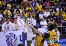 De La Salle University Green Archers’ Jamie Malonzo snatches the rebound from University of Santo Tomas Growling Tigers defenders. UAAP PHOTO