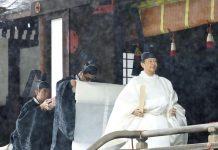Japan’s Emperor Naruhito walks after a ritual called Kashikoro-omae-no-gi, a ceremony for the Emperor to report the conduct of the Enthronement Ceremony at the Imperial Sanctuaries, at the Imperial Palace in Tokyo, Japan on Oct. 22. MANDATORY CREDIT KYODO/VIA REUTERS