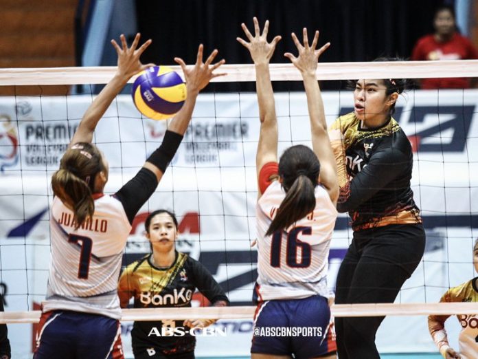 BanKo Perlas Lady Spikers’ Kathy Bersola bombs a hit towards a Chef’s Classics Lady Red Spikers defender. ABS-CBN SPORTS PHOTO