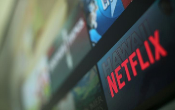 Netflix logo The Netflix logo is pictured on a television in this illustration photograph taken in Encinitas, California, United States, Jan. 18, 2017. In the new world of streaming television, advertising is not going away, but is evolving to become more like marketing on the internet – targeted to specific groups or individuals. MIKE BLAKE/REUTERS