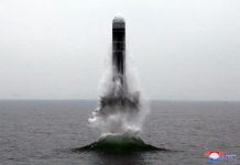 What appears to be a submarine-launched ballistic missile flies in an undisclosed location in this undated picture released by North Korea’s Central News Agency on Oct. 2. KCNA VIA REUTERS
