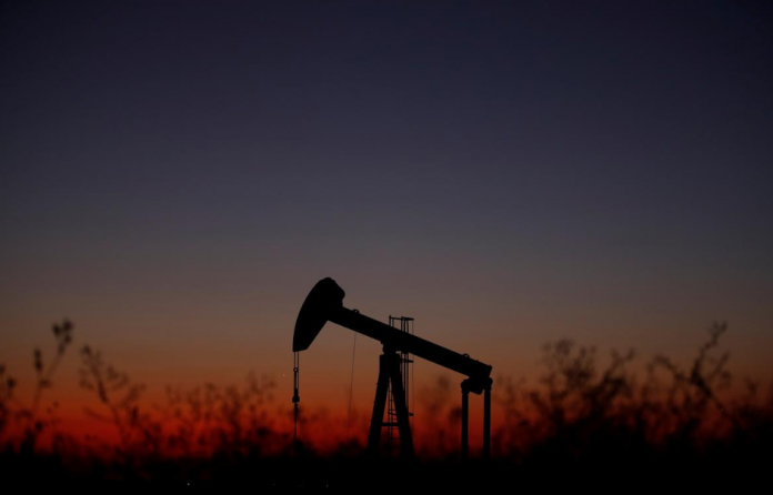 Oil pump An oil pump is seen just after sunset outside Saint-Fiacre, near Paris, France Sept. 17. CHRISTIAN HARTMANN/REUTERS