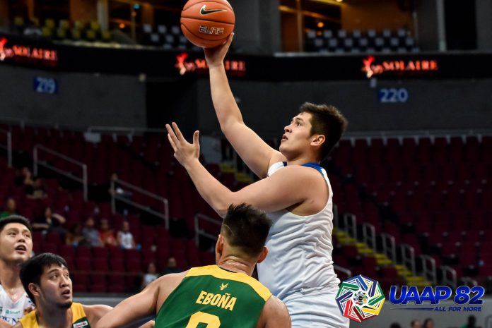Pat Maagdenberg Ateneo de Manila University Blue Eagles’ Pat Maagdenberg scores a hook shot after losing his defender Barkley Ebona of Far Eastern University Tamaraws. UAAP PHOTO