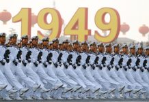 Soldiers of the People’s Liberation Army march past Tiananmen Square during a rehearsal before a military parade marking the 70th founding anniversary of People’s Republic of China in Beijing on Oct. 1. REUTERS/THOMAS PETER