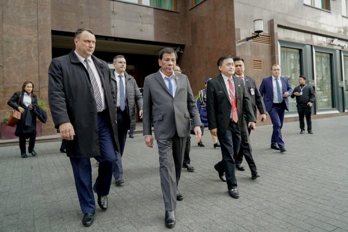 President Rodrigo Duterte Russia President Rodrigo Duterte (center) arrives at a hotel in Moscow, Russia on Oct. 2. Duterte recently invited a Russian energy giant to invest in oil and gas development in the Philippines during his visit in the foreign country. PRESIDENTIAL PHOTO