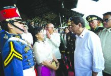 President Rodrigo Duterte shares a light moment with Vice President Leni Robredo on the sidelines of the commencement exercises of the Philippine Military Academy at Fort General Gregorio Del Pilar in Baguio City on May 26, 2019. ABS-CBN NEWS