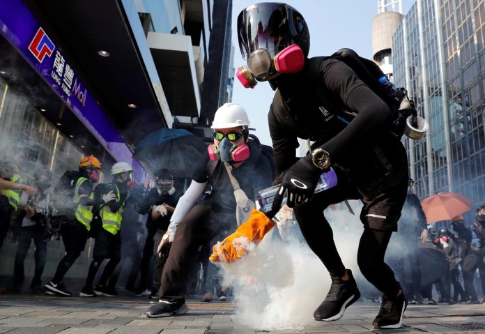 Protesters stage new rally in HK An anti-government demonstrator holds a tear gas canister during a protest in Hong Kong, China on Oct. 20. REUTERS/TYRONE SIU