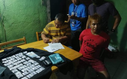Rene Tobongbanua Drug suspect Rene Tobongbanua (seated on the right) was arrested in an entrapment operation in Barangay Mansilingan, Bacolod City on Oct. 16. BACOLOD CITY POLICE OFFICE STATION