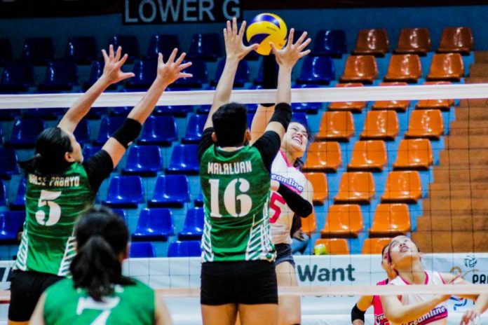Risa Sato Risa Sato of Creamline Cool Smashers has her shot foiled by PacificTown Army Lady Troopers’ Lutgarda Malaluan. SPORTS VISION PHOTO
