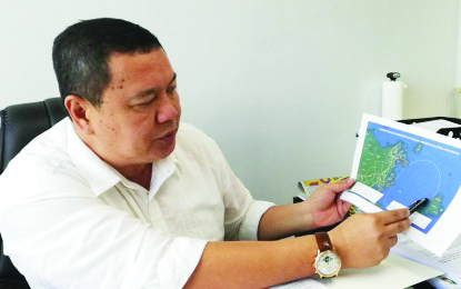 Iloilo 4th District Board member Rolando Distura identifies the locations of the high-frequency coastal radars that will be put up in Carles and Concepcion towns by the Philippine Atmospheric, Geophysical and Astronomical Services Administration (PAGASA during a briefing on Thursday. PNA