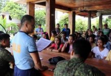 PH Army offers mass for ‘Sagay 9’ farmers Sagay City police station chief Major Antonio Benitez Jr. (standing) with officers of the Philippine Army’s 79th Infantry Battalion meets with the families of the “Sagay 9” victims on Oct. 20. 79IB/Philippine Army