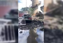 A damaged car and debris from the collapsed Nanfang’ao Bridge are seen after a typhoon hit Su’ao in Yilan county, Taiwan on Oct. 1. XINMEI LIVE SEAFOOD VIA REUTERS