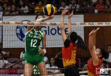 De La Salle University Lady Spikers’ Thea Gagate towers over her defenders for an attack point. USA PUBLICATIONS PHOTO