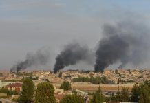 Turkey opens ground assault on Syria’s Kurds Smoke rises from the Syrian border town of Ras al-Ain on Oct. 9. REUTERS/STRINGER