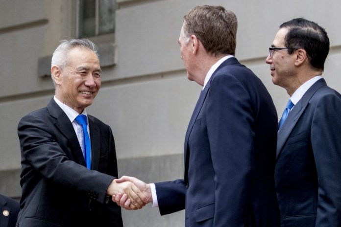 Vice Premier Liu He In this May 10 file photo, China’s Vice Premier Liu He, left, is greeted by United States (US) Treasury secretary Steve Mnuchin, center, and US Trade representative Robert Lighthizer, right, as he arrives at the Office of the United States Trade Representative in Washington. China’s Ministry of Commerce said Tuesday that Liu is going to Washington on Thursday for talks aimed at ending the tariff war. ANDREW HARNIK/AP