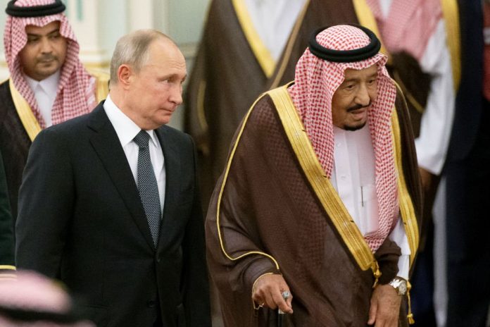 Vladimir Putin and King Salman Russian president Vladimir Putin (left) and Saudi Arabia’s King Salman attend the official welcome ceremony in Riyadh, Saudi Arabia, Oct. 14. ALEXANDER ZEMLIANICHENKO/REUTERS