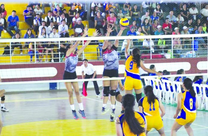 Iloilo province players block a shot by a Capiz player during this year’s Western Visayas Regional Athletic Association Meet (WVRAA) secondary girls volleyball match in Roxas City, Capiz on Feb. 18. The provincial government of Aklan, host of next year’s WVRAA Meet, already started its preparations for the event. CAPIZ AKSYON NEWS CENTER
