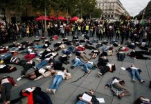 Women protest against domestic violence in Paris People stage a “die-in” at Place de la Republique during a demonstration against domestic violence in Paris, France on Oct. 19. REUTERS/BENOIT TESSIER