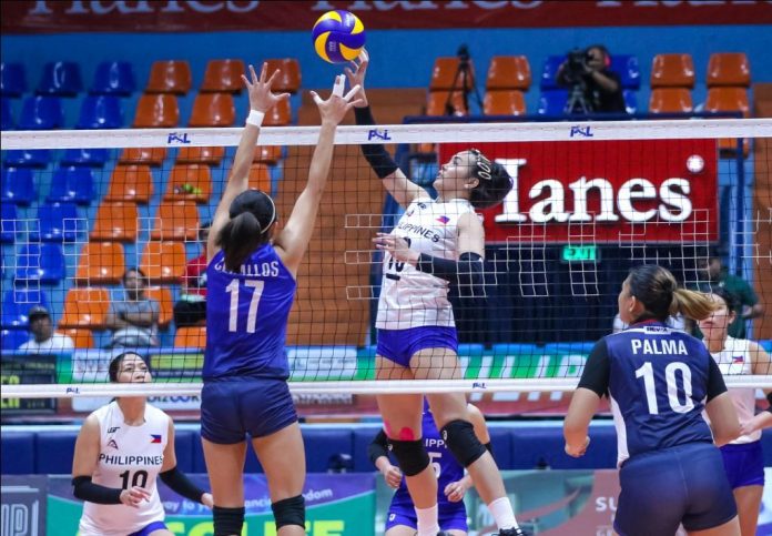 Abigail Marano Ilongga Abigail Marano of the Philippine team scores against the defense of fellow Ilongga Fiola Ceballos of PSL Shine. PSL PHOTO