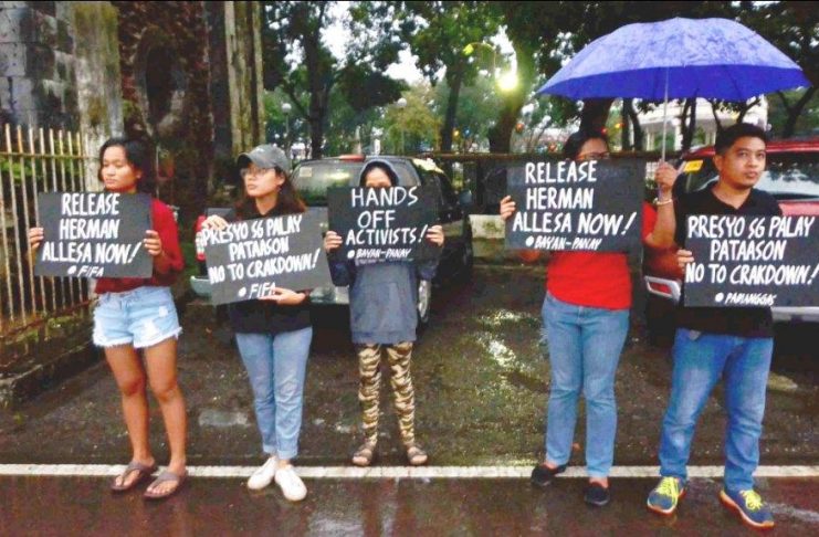 Activists call for the release of colleague Herman Allesa who was arrested in Maasin, Iloilo. Operatives of the Iloilo Police Provincial Office raided Allesa’s house and reported having recovered a grenade. Allesa had served as treasurer of the peasant group PAMANGGAS Panay and Guimaras. He was arrested on Nov. 10, 2019 by policemen as one of several John Does charged for the June 2017 New People’s Army raid of the Maasin police station. IAN PAUL CORDERO/PN