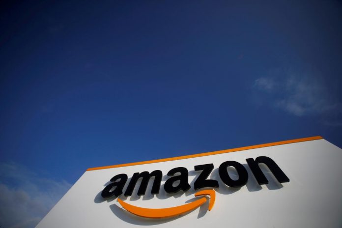 Amazon The logo of Amazon is seen at the company logistics center in Boves, France, Nov. 5, 2019. PASCAL ROSSIGNOL/REUTERS