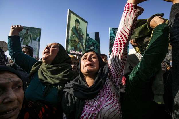 Attack on Syria’s Idlib kills at least 15 Women cry at a funeral for Syrian Democratic Forces fighters in the Syrian Kurdish-majority city of Qamishli on Nov. 16. DELIL SOULEIMAN/AFP/GETTY IMAGES
