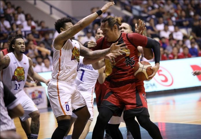 Bobby Ray Parks Jr. TNT KaTropa’s Bobby Ray Parks Jr. disrupts San Miguel Beermen’s June Mar Fajardo. PBA PHOTO