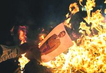 Separatist protesters burned pictures of Spain's King Felipe VI. EPA