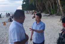 Chinese Embassy Consul General Lou Gang gives instructions to Chinese liaison officer Peter Tay during their visit in Boracay Island, Malay, Aklan. JUN AGUIRRE/PN