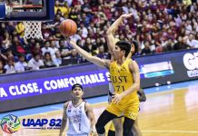 University of Santo Tomas Growling Tigers’ Crispin Cansino goes for an inside hit. UAAP PHOTO
